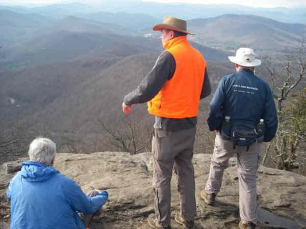 Standing on the massive boulders above the shelter.