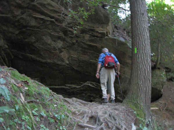The trail leads you under several rock ledges.