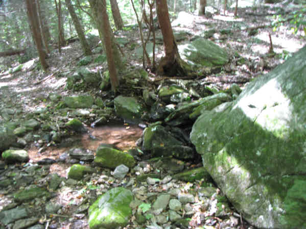 Several creek crossings. Here a boulder-filled creek.