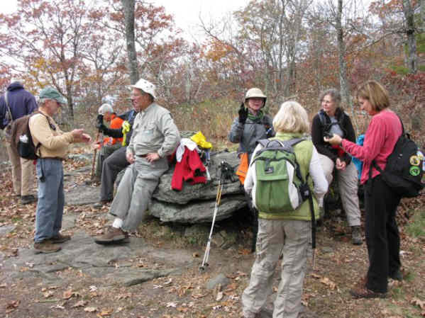 On the way back, the group takes a short break after a long tough climb.