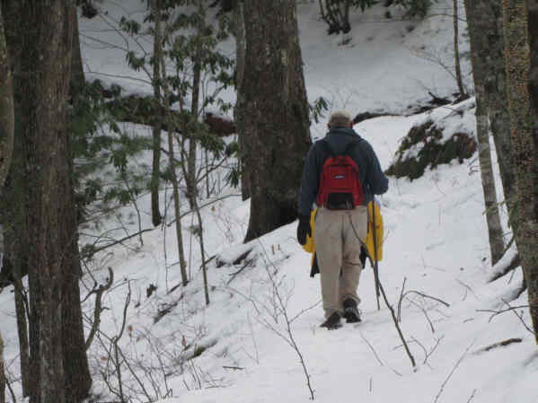 We turn a corner to the other side of the mountain and find the snow is several inches deep!