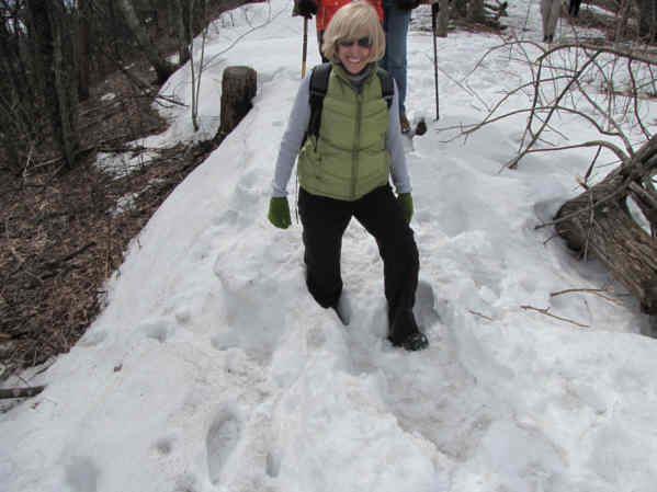 The snow in the trail here is knee deep to Pam!