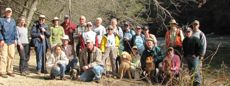 The OFHC gang for today's hike (l-r kneeling)Jackie Crisp, Bill Hunt, "Merlin the trail dog", Chuck Crisp, "Honey the trail dog", Lynne Porter-Whitmire, David Hinson and "Faith the trail dog", Lynne Saporito and "Hope the trail dog". (standing l-r) Tony Presley, Carole Wintle, David Whitaker, Karen Brown, Don Preece, Jack Jacobi, Donna Presley, June Bellamy, Geri Whitaker, John Bellamy, Rick Porter-Whitmire, Jeanne O'Connor, Bruce O'Connor, Dick Metzgar, Vic Robson and Joe Raguckas.