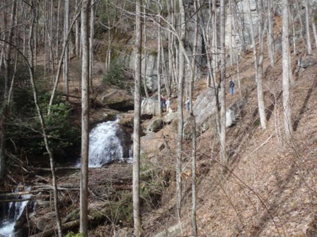 A waterfall just below the cliffs.