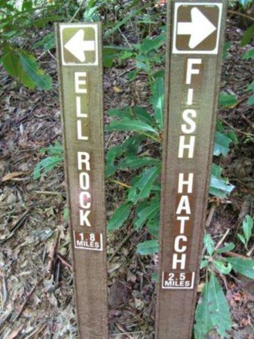 Trail markers near the bridge as we turn toward the fish hatchery.