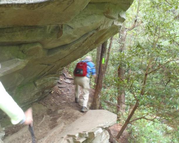 The trail passes under a nice rock outcropping.