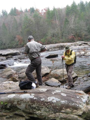 Rock hopping below the falls.