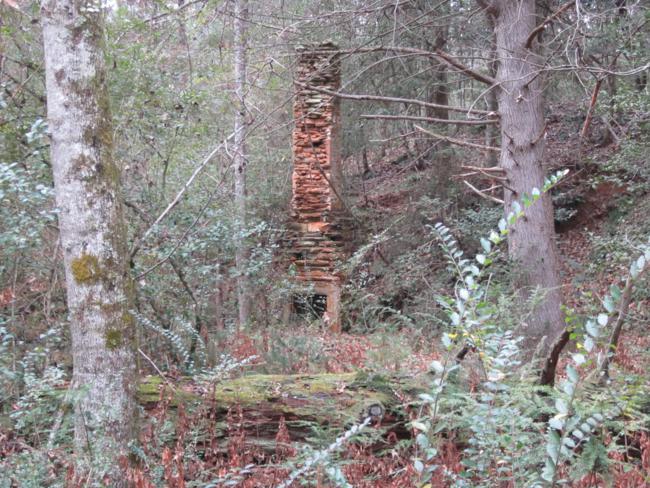 We pass the remaining rock chimney of this farm house from the 1930's.