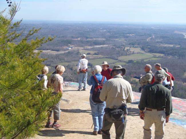 Taking in the view from one of the rock cliffs at Currahee Mountain.