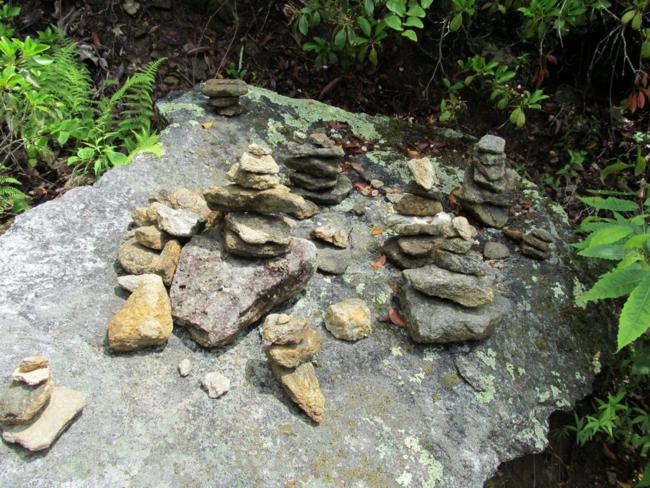A common site along hiking trails. Stacked stones called "Preece rocks".