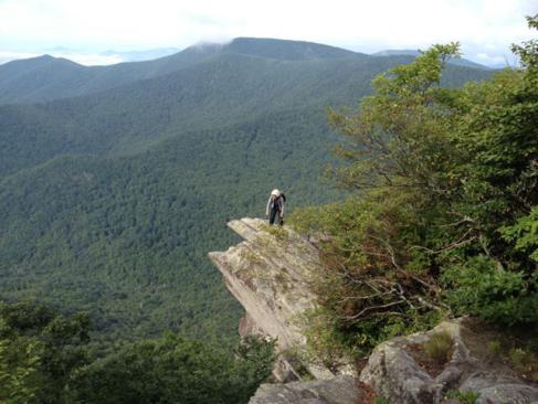 The most famous rock outcrop at Pickens Nose. Pam Euliss is the daredevil!