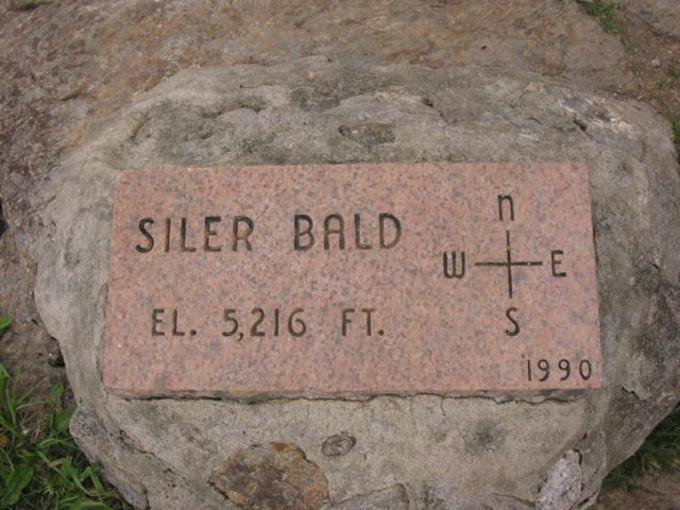Marker at the summit .
