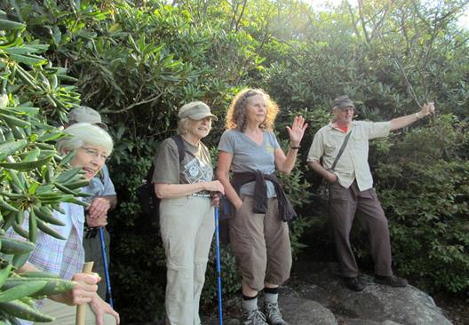 Our hikers are surprised to see some NUT standing out on the breathtaking rock!