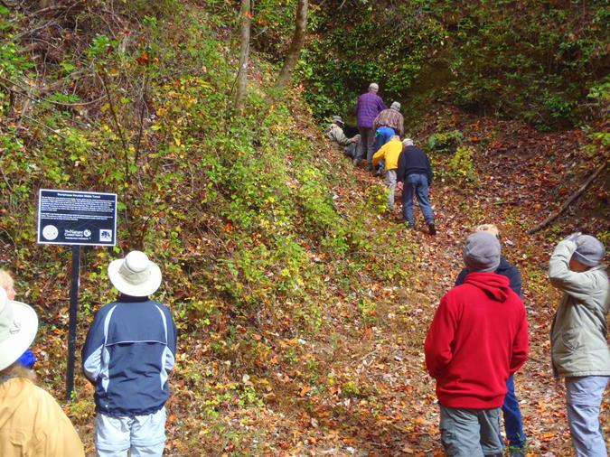 We inspect the Middle Tunnel which is not passable and much of it is under water. A bat-friendly gate is located just inside the entrance of the tunnel.