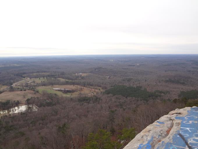 From the south rock face we see a mostly flat horizon. Currahee is the last mountain on the chain.