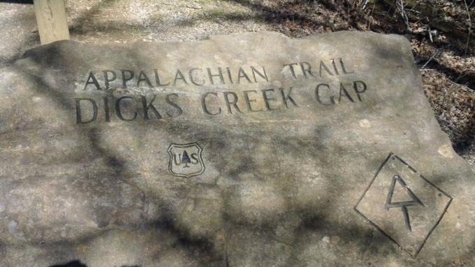The engraved boulder at the start.