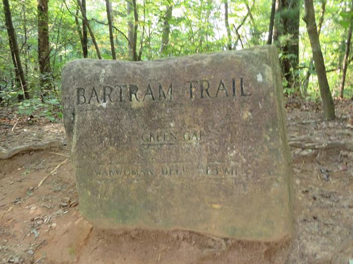 One of the engraved stone Bartram Trail markers .