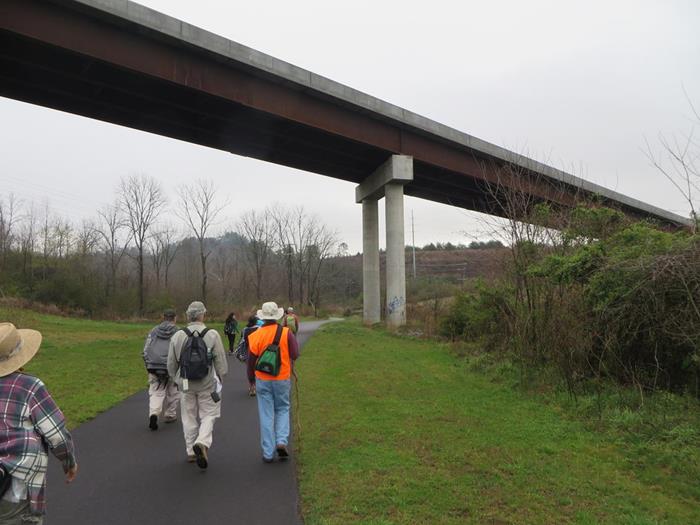 Crossing under the highway bridge.