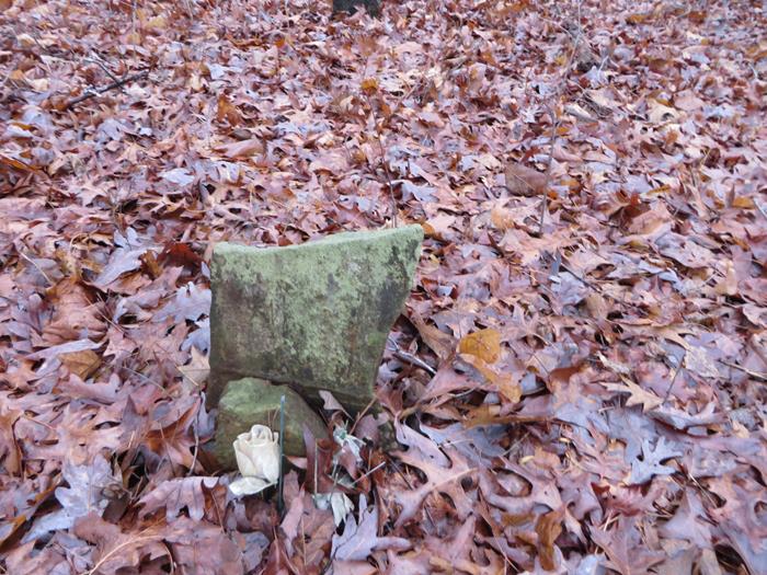 Most of the graves are identified with a rock.