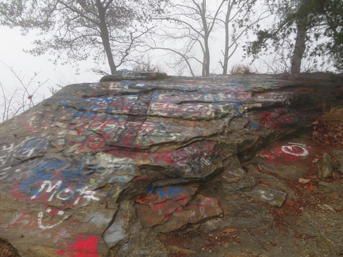 Near the summit we start to see the shamefully painted rocks!
