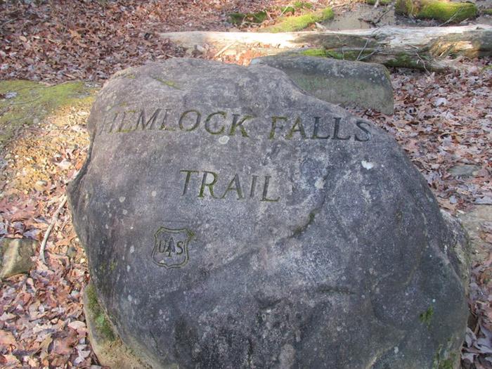 Engraved boulder at the start.