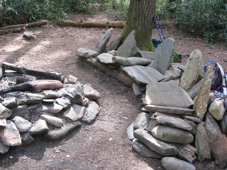 Lots of nice camping/picnic spots along the river. This one has nice rock chairs!