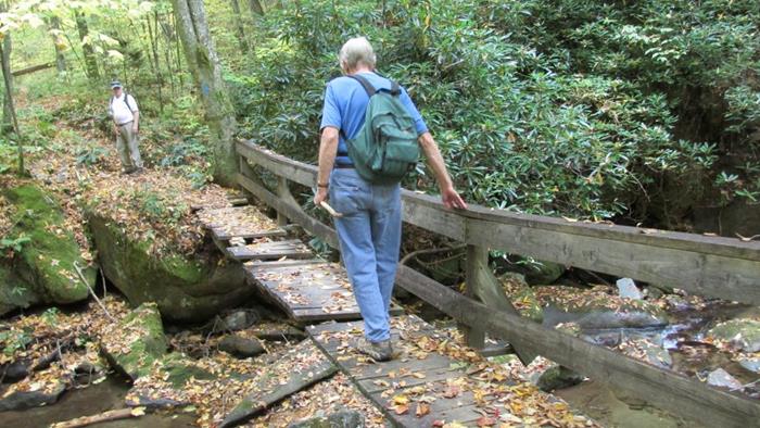This footbridge is missing a few boards.
