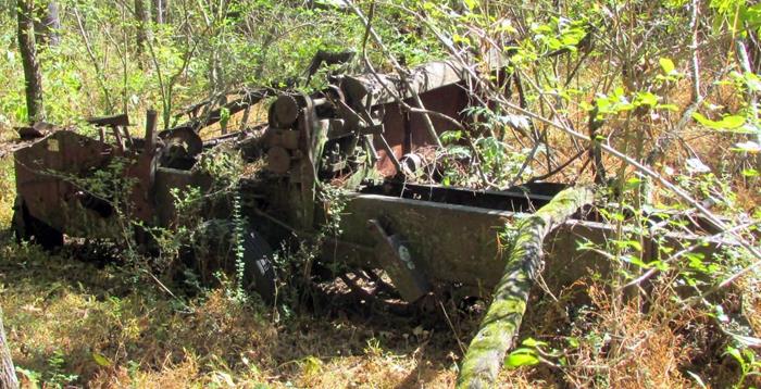 An old abandoned hay baler