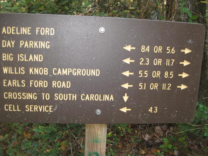 Trail sign at Adeline Ford.