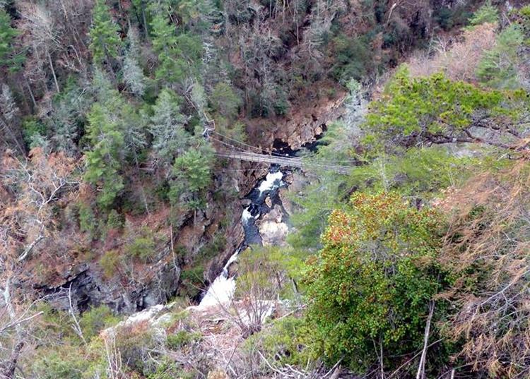 Looking deep into the gorge we can see the suspension bridge above Hurricane Falls.
