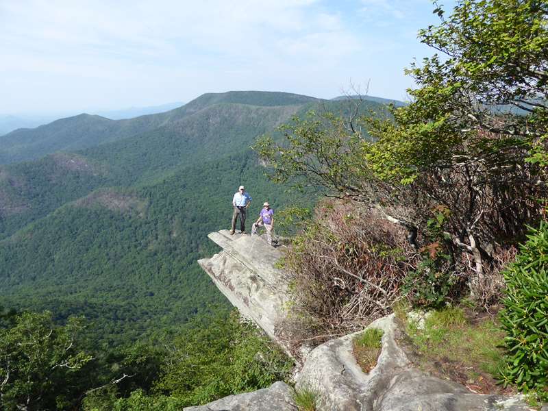 Mike and Dick pose on the famous rock outcrop on Pickens Nose.