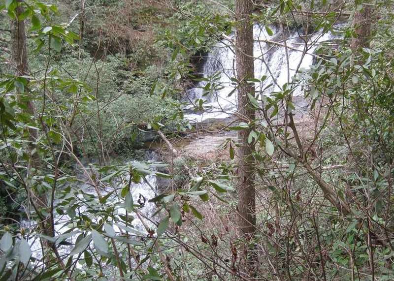 We pass by Lick Log Falls , a large roaring two section falls!