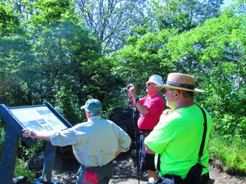 There are educational signs at each view point along the rim of the rock cliffs.