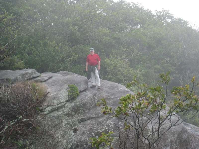 The Pickens Nose Trail features lots of massive rock cliffs .