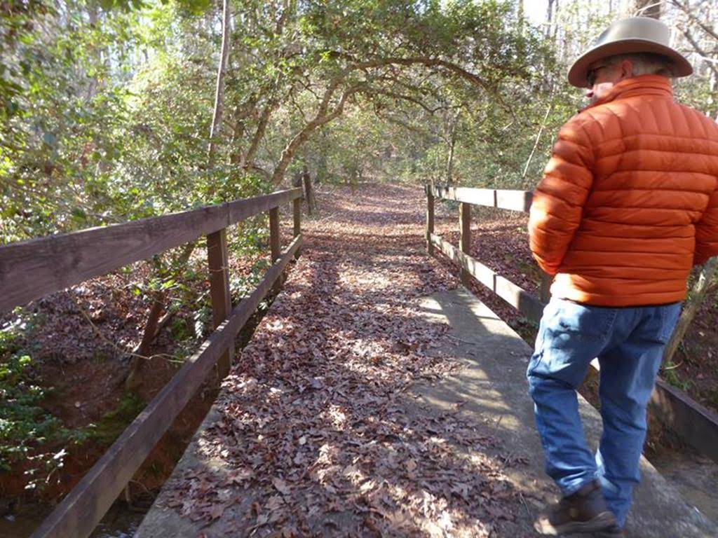 Footbridge across the end of the pond.