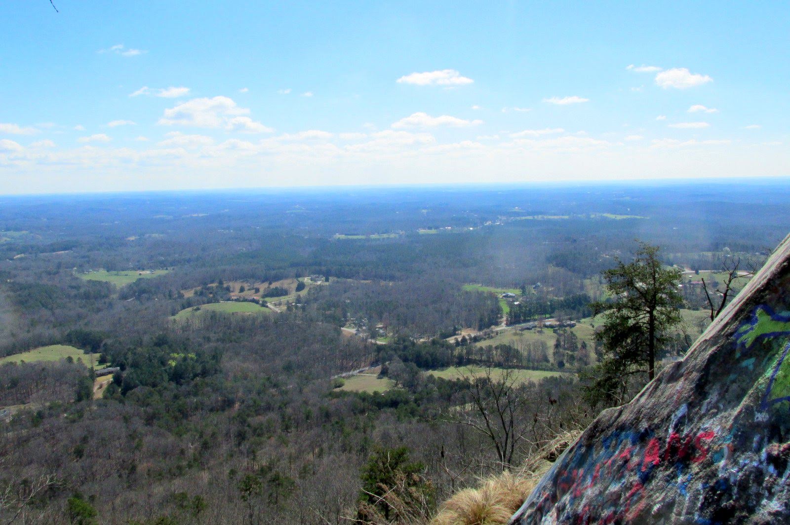 Approaching the summit and graffiti-faced rocks.