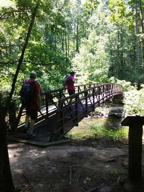 The iron footbridge across the Whitewater River.