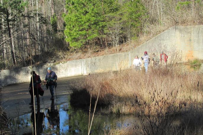 Walking across the spillway of the dam. Most days you cannot do this, but the water was low enough.