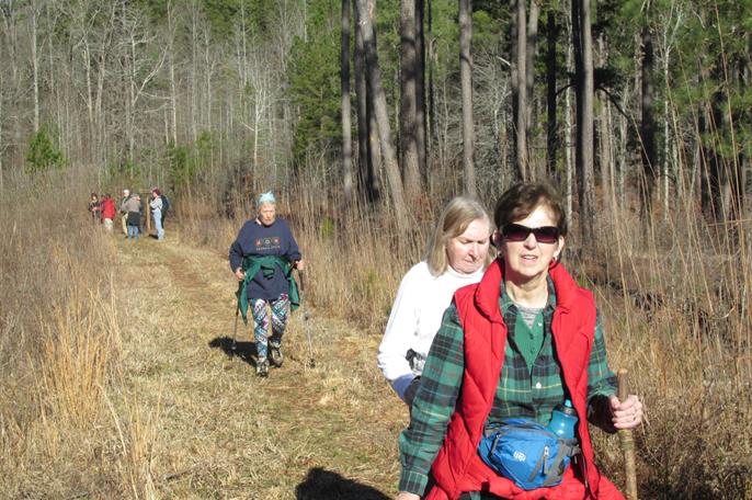 Walking across the earthen portion of the dam.